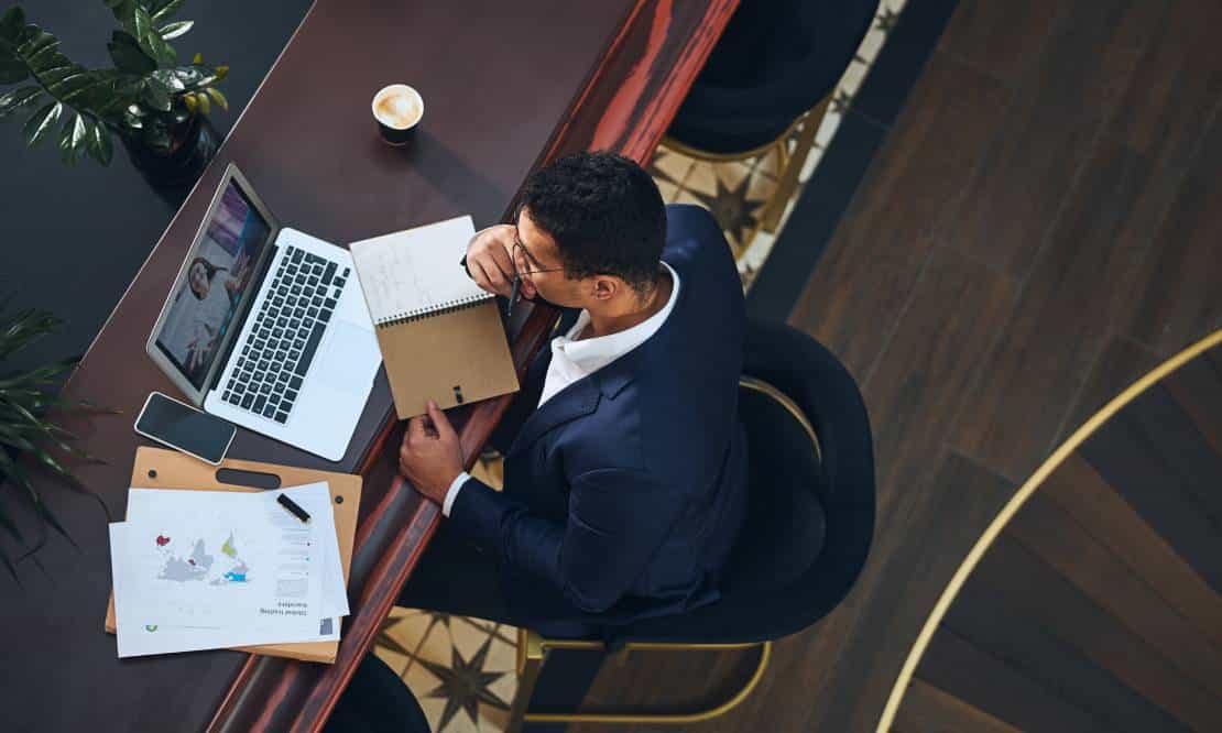 Businessman watching a video on a laptop